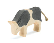 Ostheimer Ostheimer - Cow black & white eating - Wooden animal - Pearls & Swines