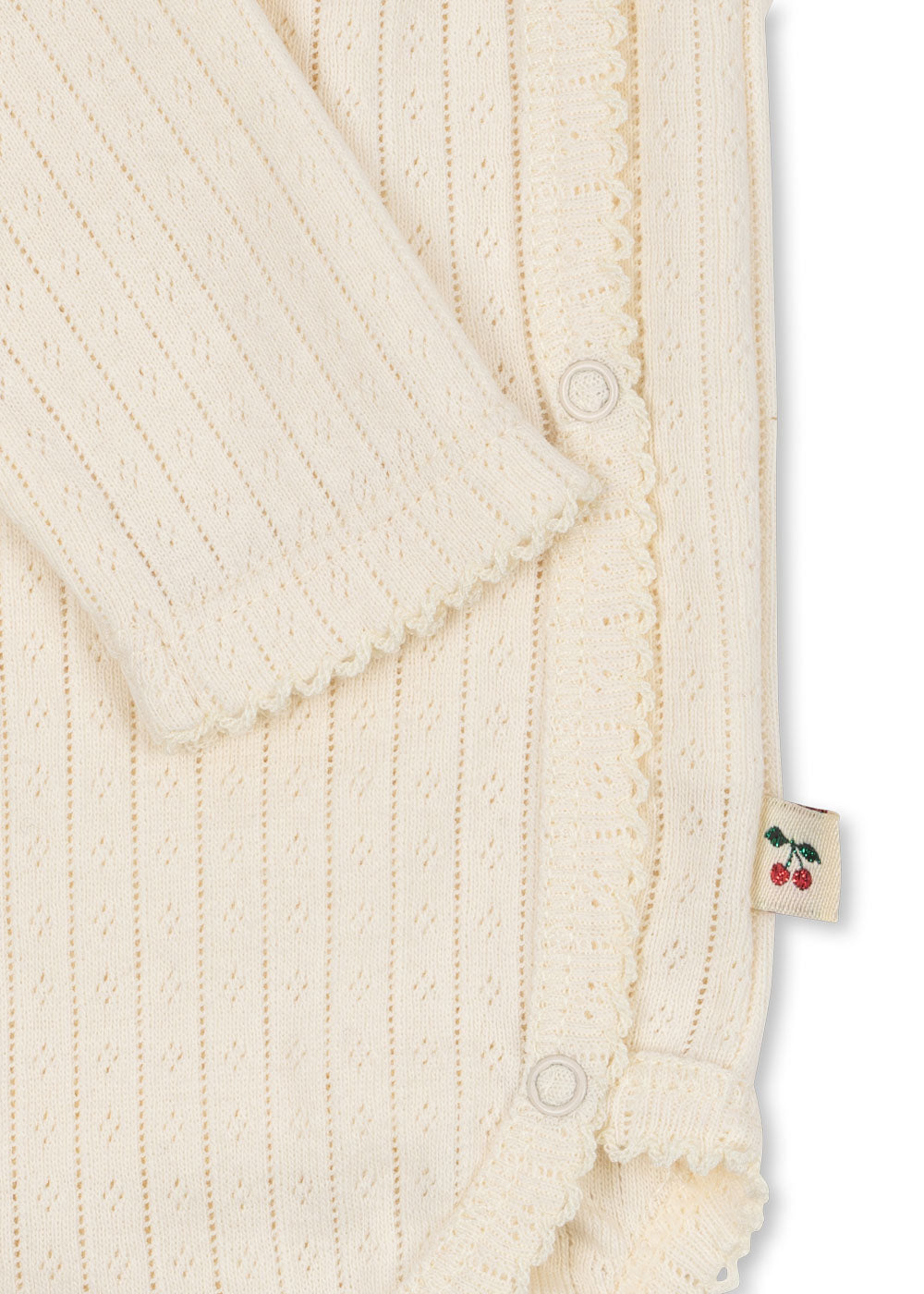 Konges Sløjd Konges Sløjd - Minnie Newborn Body GOTS - Buttercream - Pearls & Swines